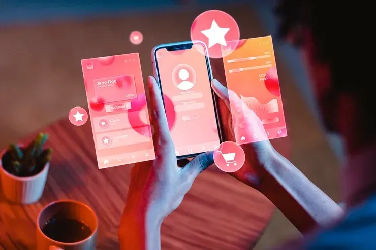 Hands holding a smartphone with floating app screens and star icons